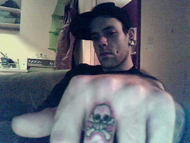 Skull Tattoo. this guy got my painting tattooed on his finger. he also got 